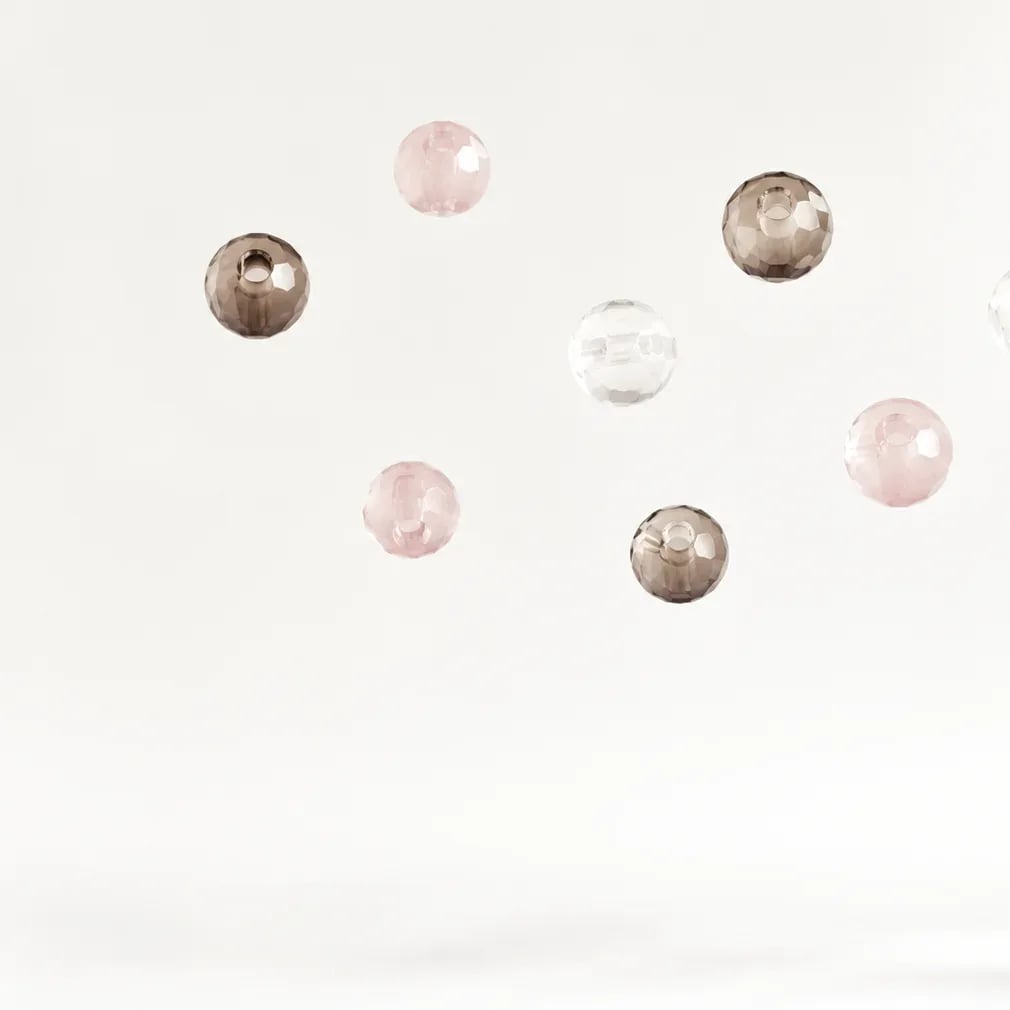 Assorted crystal beads floating